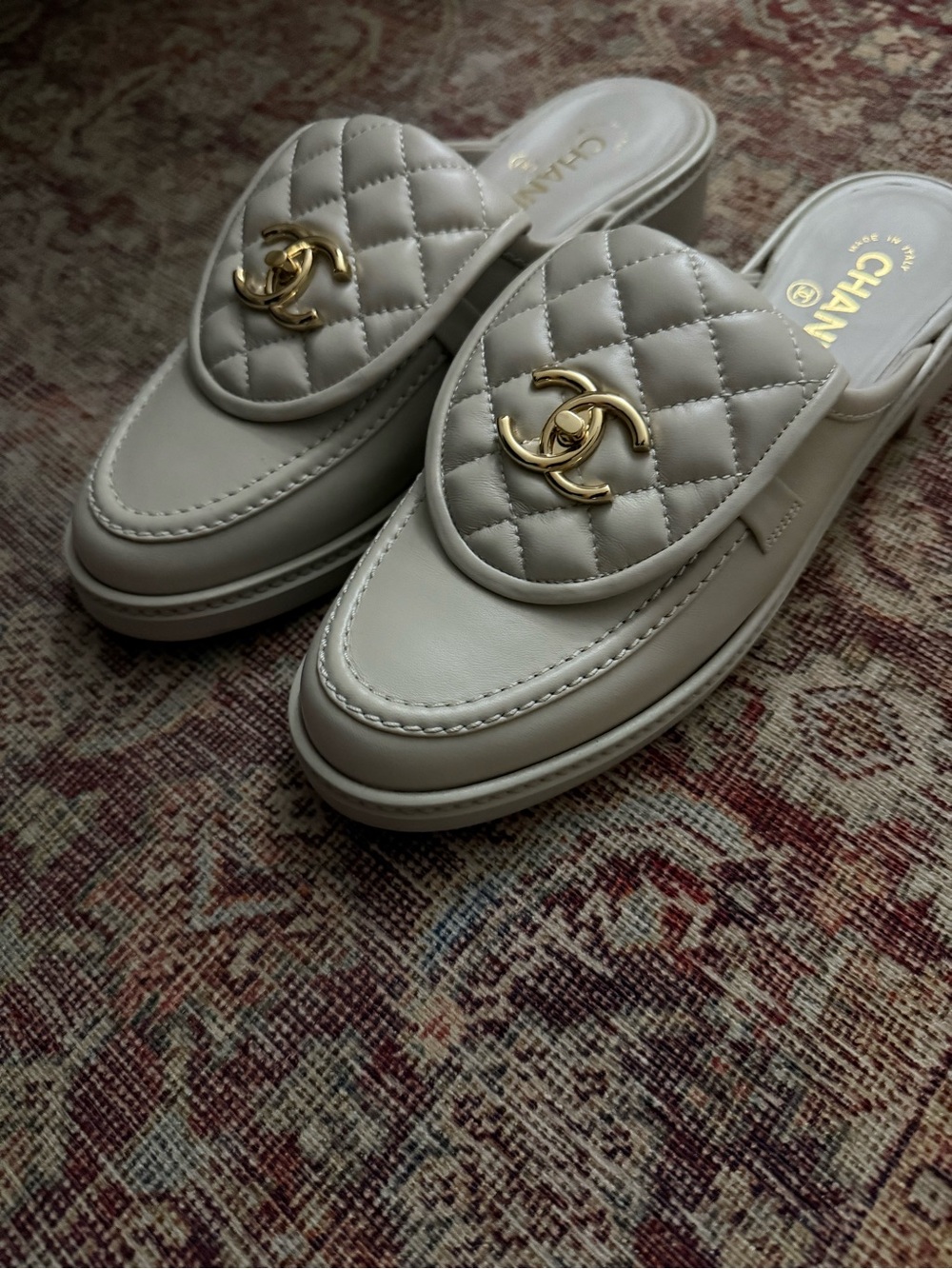 Chanel Quilted Leather Slide Mules in Light Gray with Gold CC